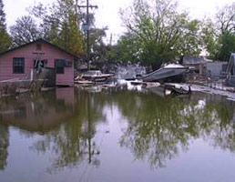 The Lower 9th Ward in New Orleans is still flooded weeks after Hurricane Katrina 258x200