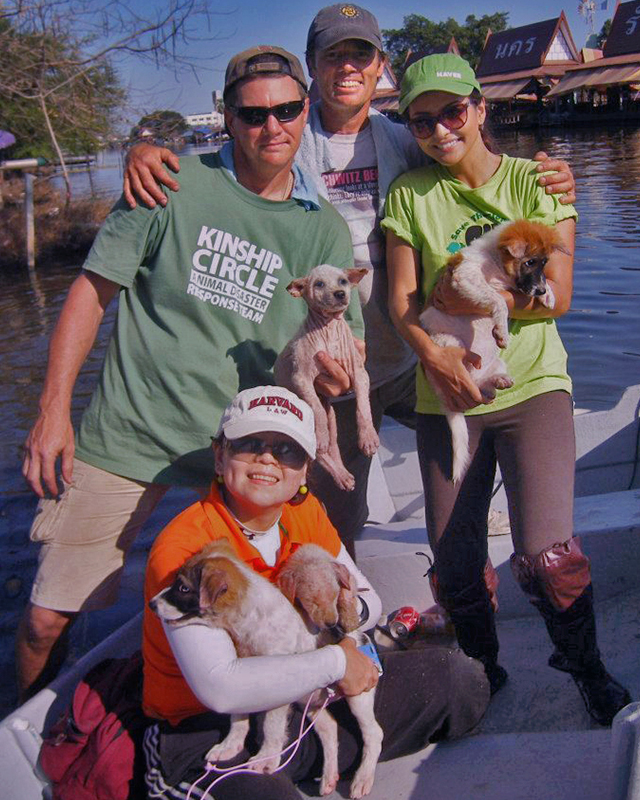 Ron Presley joins a deep-water boat team, led by Save Elephant Foundation's Darrick Thomson. (c) Kinship Circle, Thailand Floods