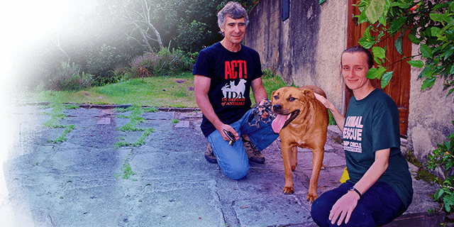 Cheri and Carlos with deserted dog, Kinship Circle