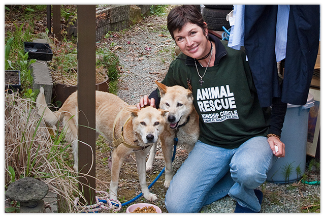 Kinship Circle's Lexie Cataldo comforts dogs whose person lost means to care for them, photo copyright Kinship Circle
