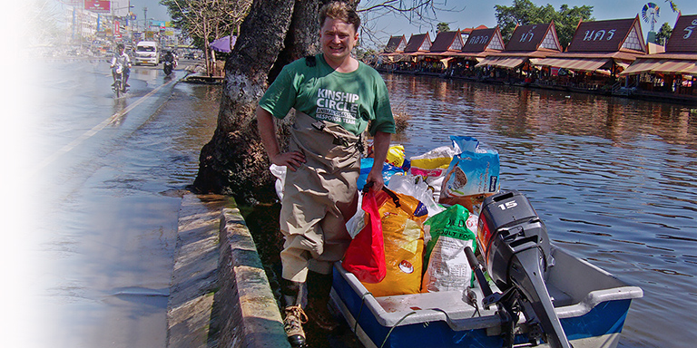 Bryan Grant gives food to stranded people, Kinship Circle